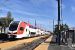 Caltrain # 631 about to make its station stop at Broadway